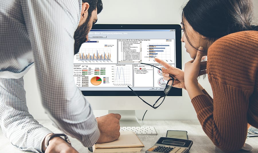 team working in graph on computer screen