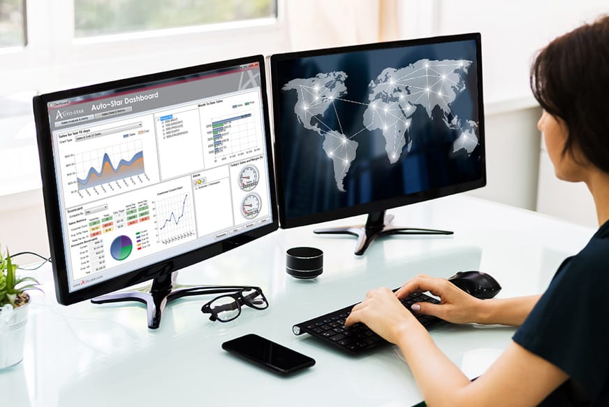 Analyst employee looking at reporting screens